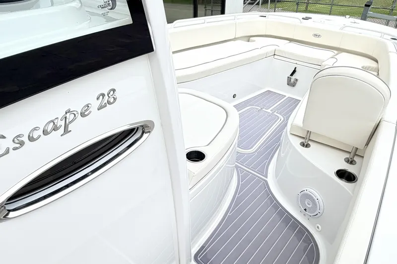 Slide: The Image of 2023 Sea Hunt Escape 28 boat interior with sleek seating and modern design. - 21