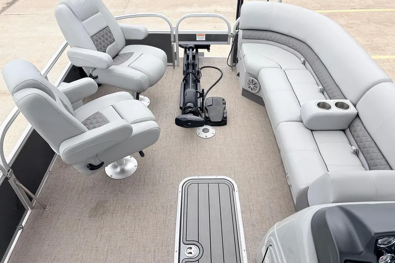 Slide: The Image of 2021 Ranger 223FC boat interior with plush seating and modern design. - 10