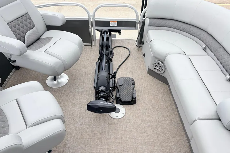 Slide: The Image of Interior of 2021 Ranger 223FC boat with plush seating and Garmin equipment. - 13