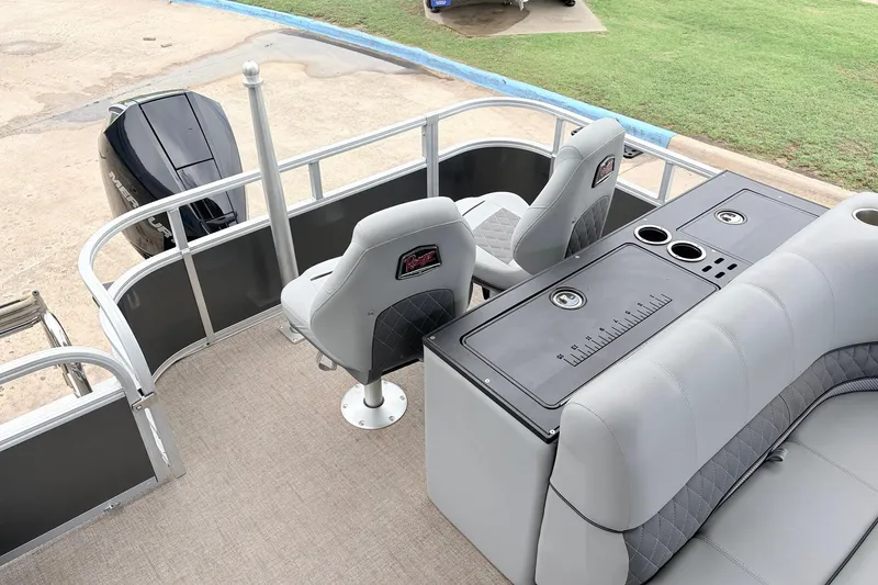 Slide: The Image of 2021 Ranger 223FC pontoon boat interior with seating and storage compartments. - 37