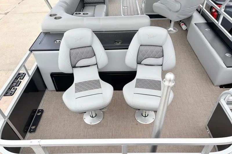 Slide: The Image of 2021 Ranger 223FC boat interior with plush seating and modern design. - 39