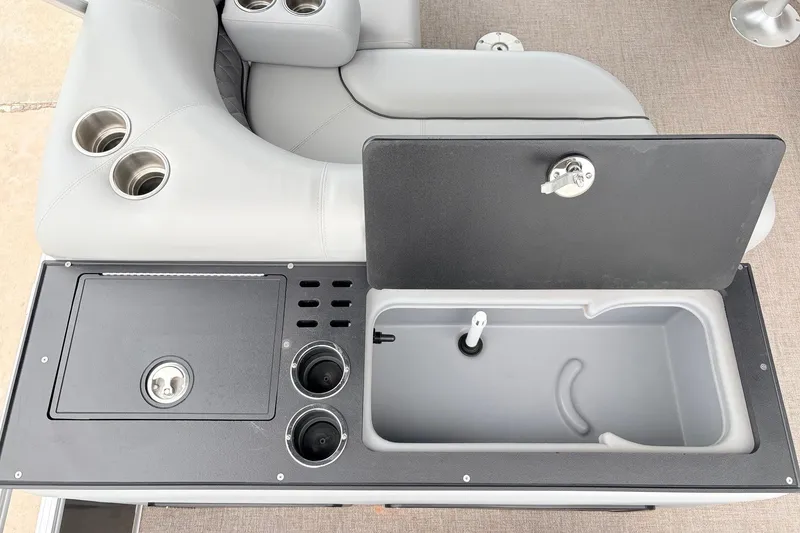Slide: The Image of Pontoon boat interior with cup holders and storage compartment, Ranger 223FC, 2021 model. - 42