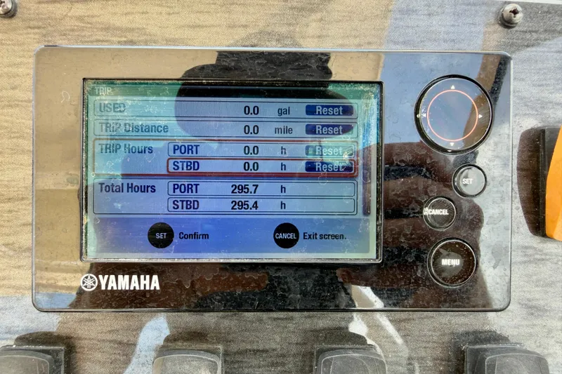 Slide: The Image of Yamaha display on 2015 Grady-White Freedom 275 showing trip and total engine hours. - 20