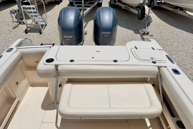 Slide: The Image of 2015 Grady-White Freedom 275 boat interior with dual Yamaha 200 engines. - 29