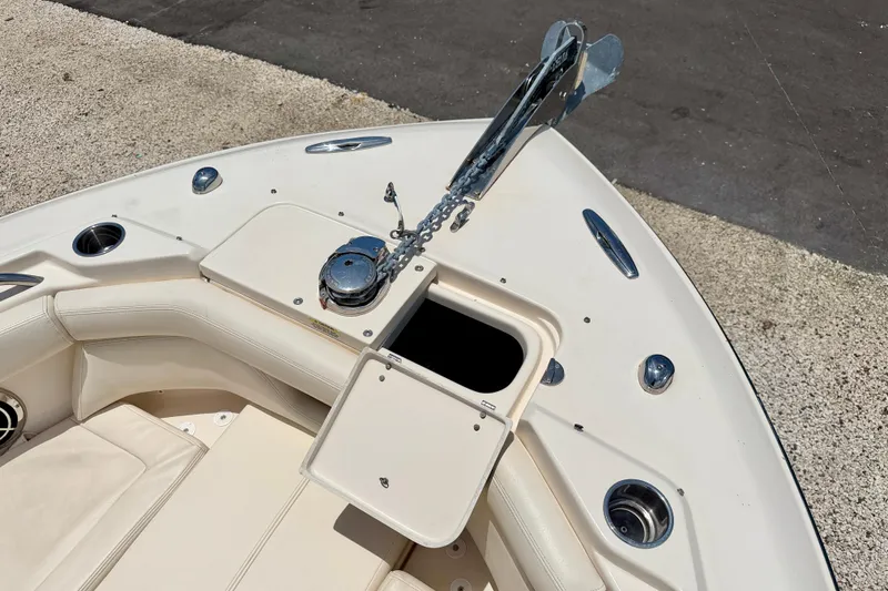 Slide: The Image of Bow area of 2015 Grady-White Freedom 275 boat with anchor and seating. - 33