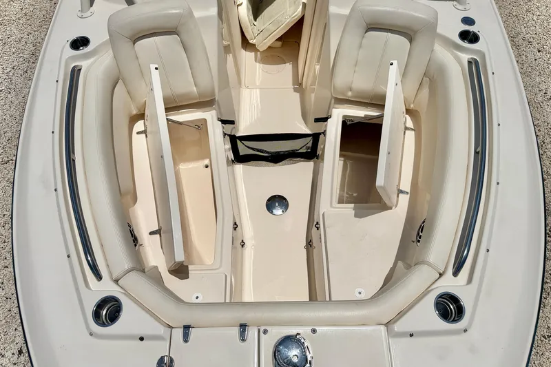 Slide: The Image of 2015 Grady-White Freedom 275 boat interior with open storage compartments. - 34
