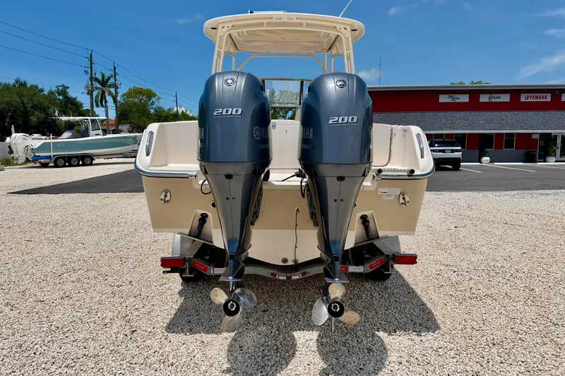 Slide: The Image of 2015 Grady-White Freedom 275 boat with twin Yamaha 200 engines on a trailer. - 6