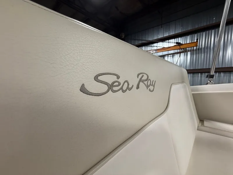 Slide: The Image of Sea Ray 220 Sundeck 2012 interior with logo. - 35