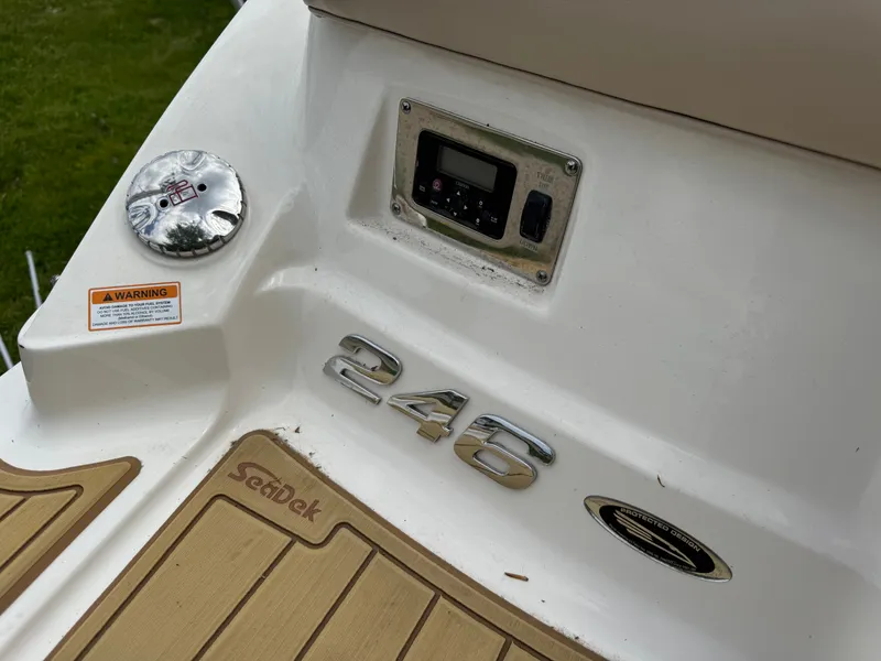 Slide: The Image of Rear view of a 2011 Chaparral 246 SSi boat with controls. - 27