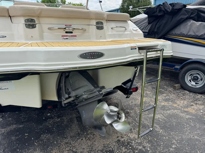 Slide: The Image of Rear view of a 2011 Chaparral 246 SSi boat with ladder and propeller. - 32