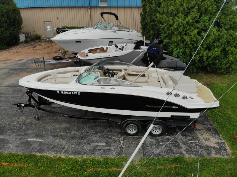 Slide: The Image of 2011 Chaparral 246 SSi boat parked on trailer. - 5