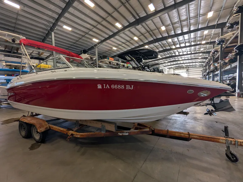 The Image of 2011 Cobalt 242 boat in warehouse on trailer. - 1