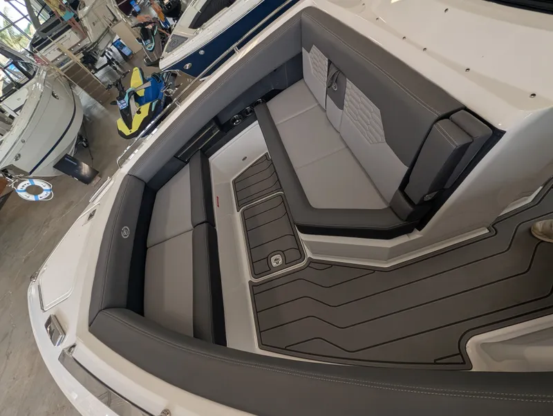 Slide: The Image of Interior of 2026 Cobalt A29 boat with gray upholstery. - 22
