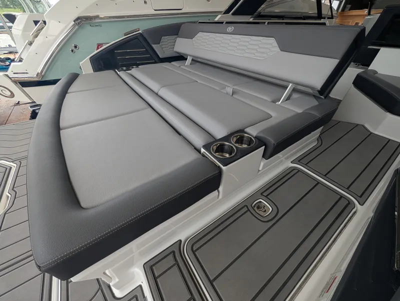 Slide: The Image of 2026 Cobalt A29 boat featuring luxurious gray seating area. - 26