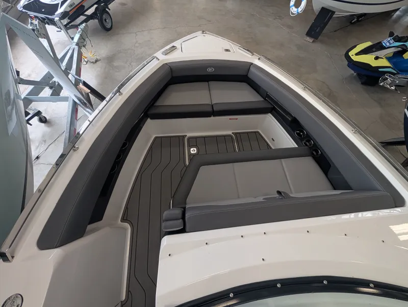 Slide: The Image of Interior of 2026 Cobalt A29 boat with gray upholstery. - 31