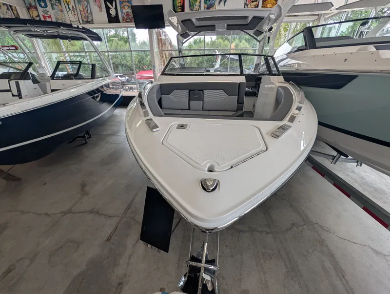 Slide: The Image of 2026 Cobalt A29 boat in showroom, front view. - 4