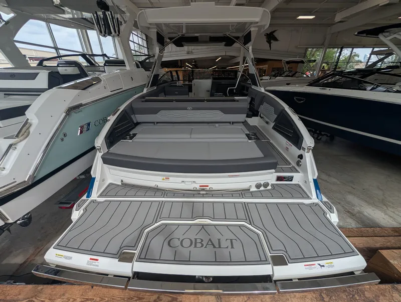 Slide: The Image of 2026 Cobalt A29 boat in showroom, luxurious design. - 8