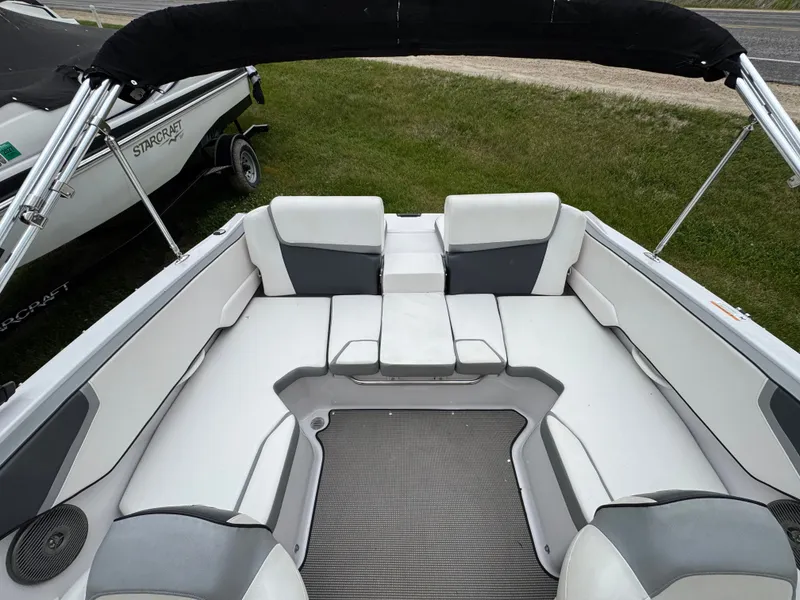 Slide: The Image of Interior of a 2017 Scarab SB 195 JET boat with gray and white seating. - 14