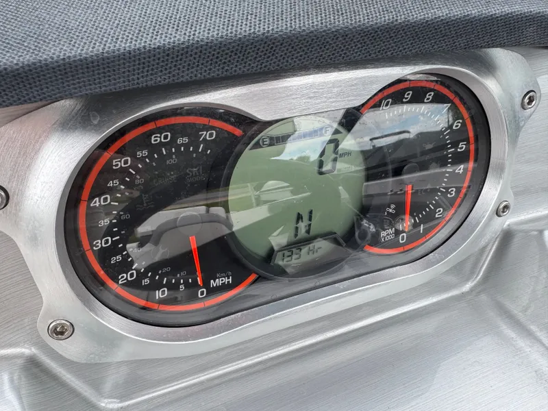 Slide: The Image of Dashboard of a 2017 Scarab SB 195 JET boat with speedometer. - 17