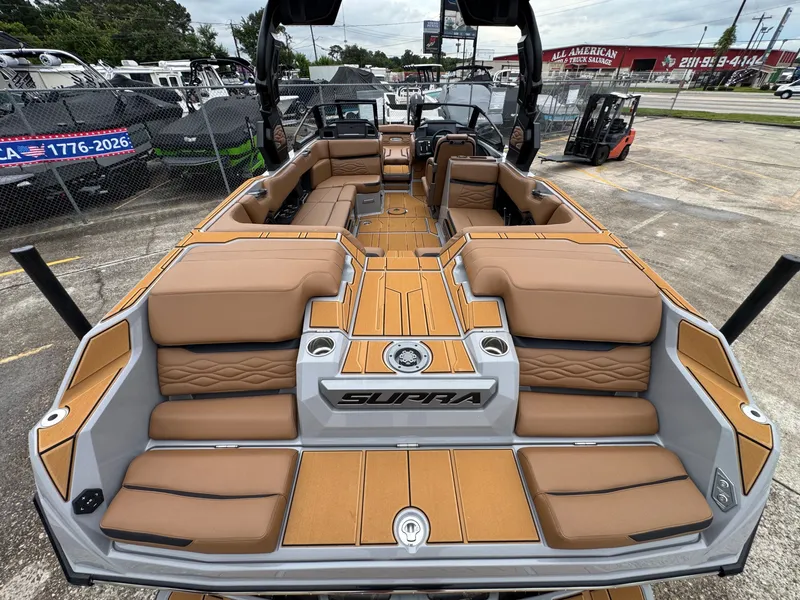 Slide: The Image of Interior view of 2026 Supra SL 450 boat with luxurious seating. - 10