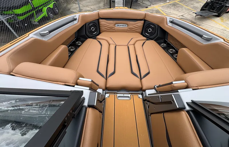Slide: The Image of Interior of Supra SL 450 boat, luxurious seating, model year 2026. - 11