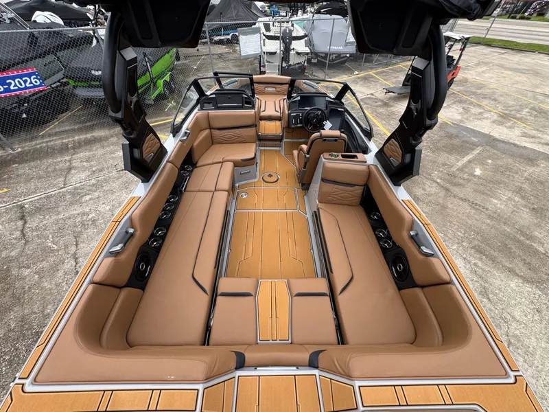 Slide: The Image of Interior of 2026 Supra SL 450 boat with luxurious leather seating. - 9