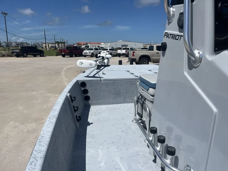 Slide: The Image of 2024 Freedom PATRIOT boat on parking lot under sunny skies. - 11