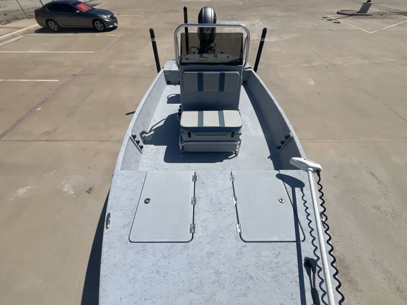 Slide: The Image of 2024 Freedom PATRIOT boat on parking lot, front view. - 17