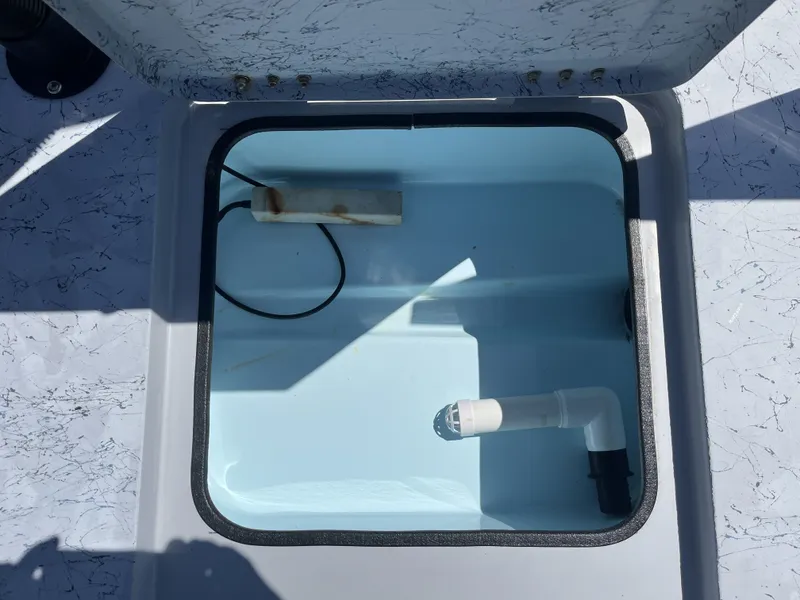 Slide: The Image of 2024 Freedom PATRIOT boat hatch with pipe and cable. - 24