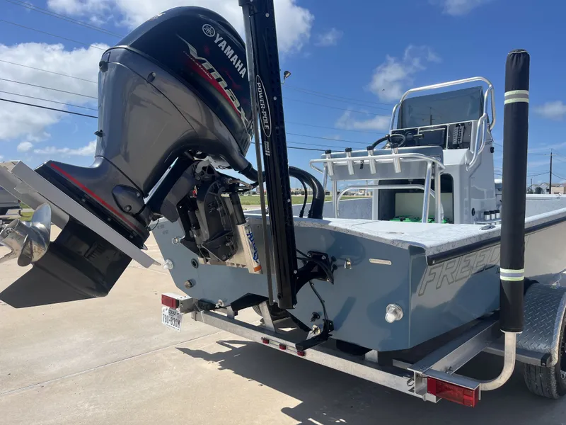 Slide: The Image of 2024 Freedom PATRIOT boat with Yamaha outboard motor. - 8