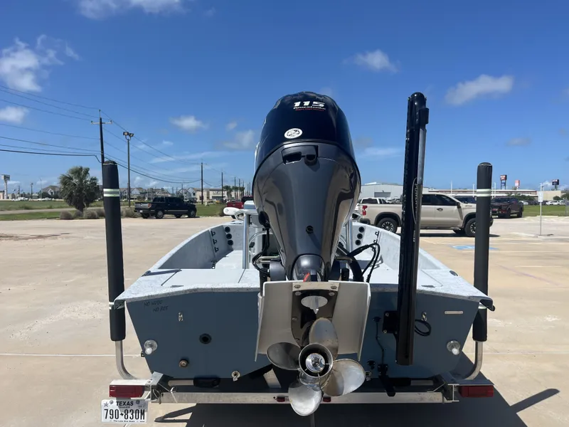 Slide: The Image of 2024 Freedom PATRIOT boat with outboard motor on trailer. - 9