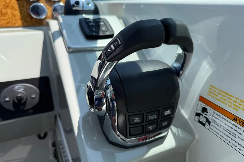 Slide: The Image of Throttle control panel of a 2012 Formula 350 Sun Sport boat. - 19