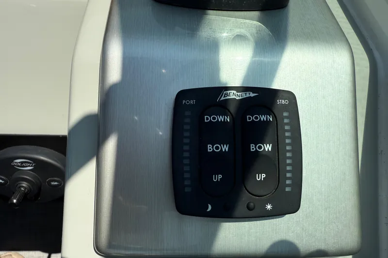 Slide: The Image of Bennett trim tab control panel on 2012 Formula 350 Sun Sport boat. - 20
