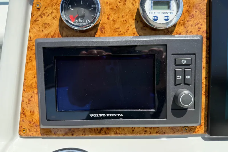 Slide: The Image of Dashboard of a 2012 Formula 350 Sun Sport with Volvo Penta display and gauges. - 21