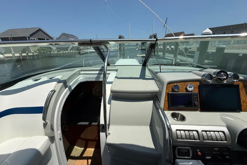 Slide: The Image of Interior view of 2012 Formula 350 Sun Sport boat cockpit with dashboard and seating. - 29