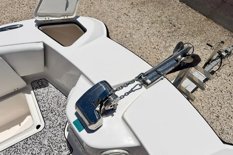 Slide: The Image of 2021 Twin Vee 240 GFX DC boat anchor system and storage compartments. - 31