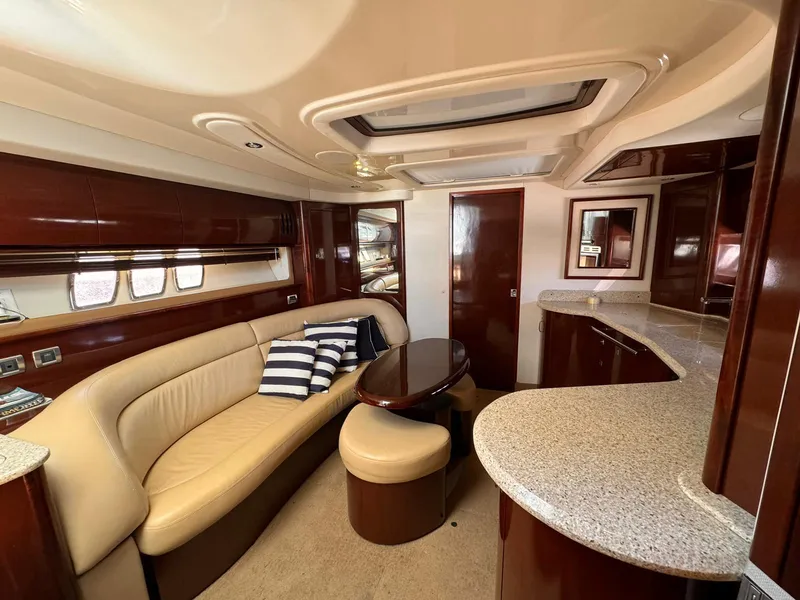 Slide: The Image of Luxurious interior of 2008 Sea Ray Sundancer yacht with elegant seating and modern design. - 4