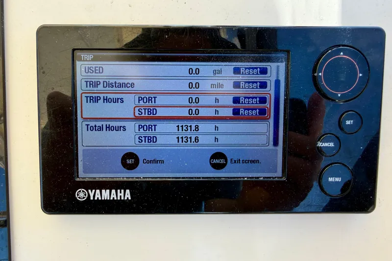 Slide: The Image of Yamaha display showing trip and total hours for Grady-White Journey 258, 2016 model. - 13