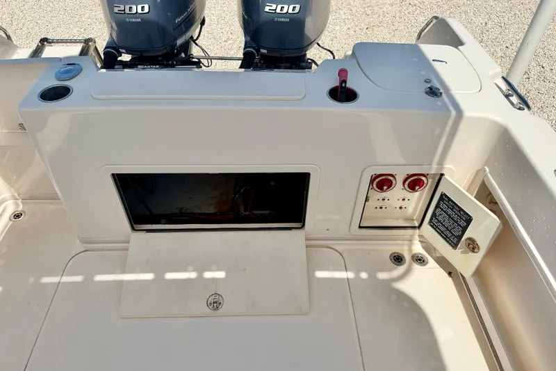Slide: The Image of 2016 Grady-White Journey 258 boat deck with dual Yamaha 200 engines. - 19