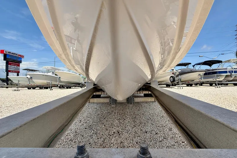 Slide: The Image of 2016 Grady-White Journey 258 boat on trailer at dealership, showcasing hull design. - 30