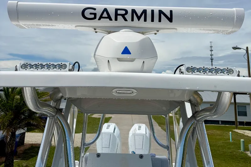 Slide: The Image of 2024 SeaHunter 31 Tournament boat with Garmin radar and LED lights on the roof. - 12