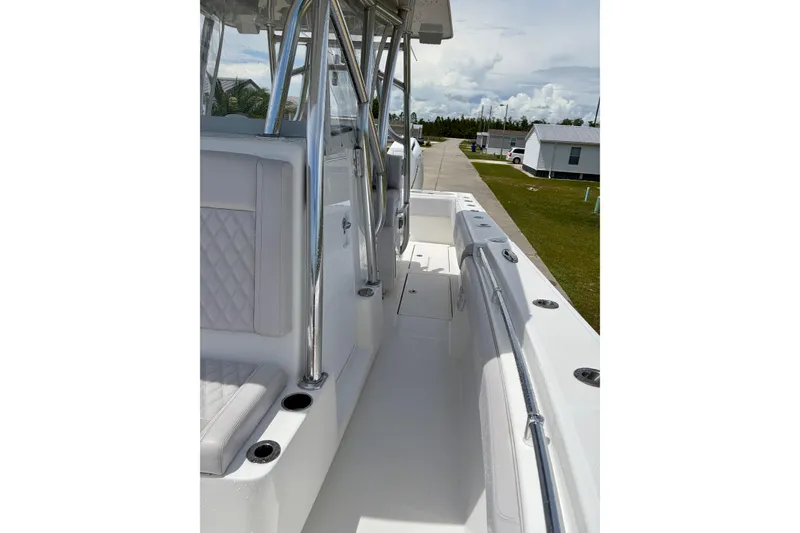 Slide: The Image of 2024 SeaHunter 31 Tournament boat interior with sleek seating and stainless steel fixtures. - 18