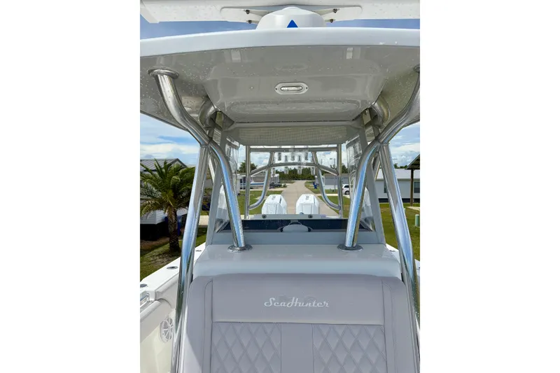 Slide: The Image of 2024 SeaHunter 31 Tournament boat interior with sleek design and sturdy metal framework. - 19