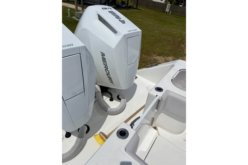 Slide: The Image of 2024 SeaHunter 31 Tournament boat with dual Mercury outboard engines. - 30