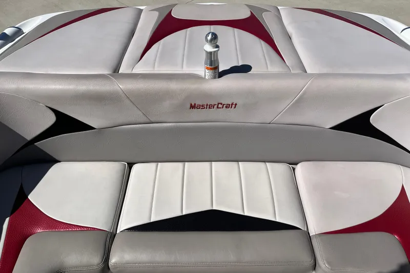 Slide: The Image of 2007 MasterCraft X-15 boat interior with red and white upholstery design. - 16