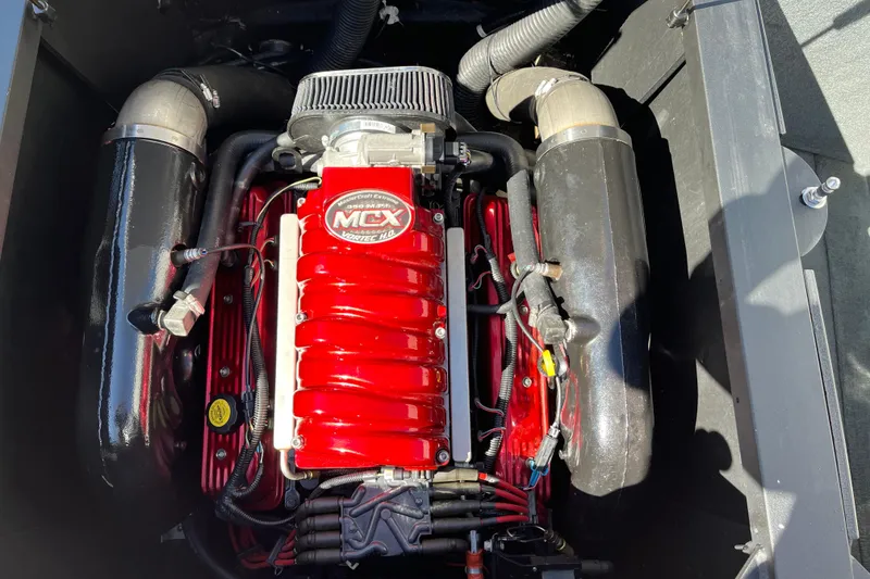 Slide: The Image of 2007 MasterCraft X-15 engine with red MCX Vortec cover, detailed view. - 17