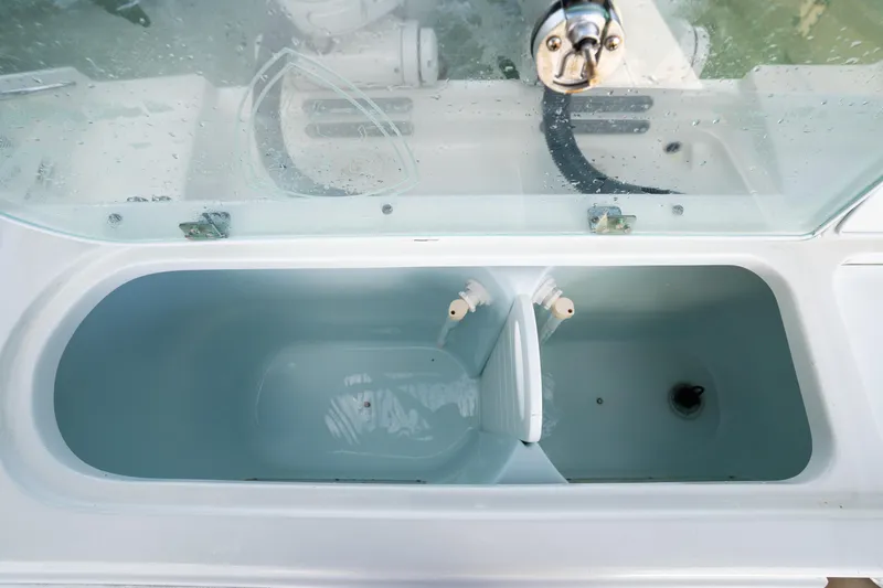 Slide: The Image of Livewell on a 2019 Century 3200 Center Console boat, filled with water. - 11