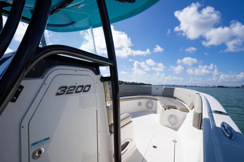 Slide: The Image of 2019 Century 3200 Center Console boat on water under blue sky. - 23