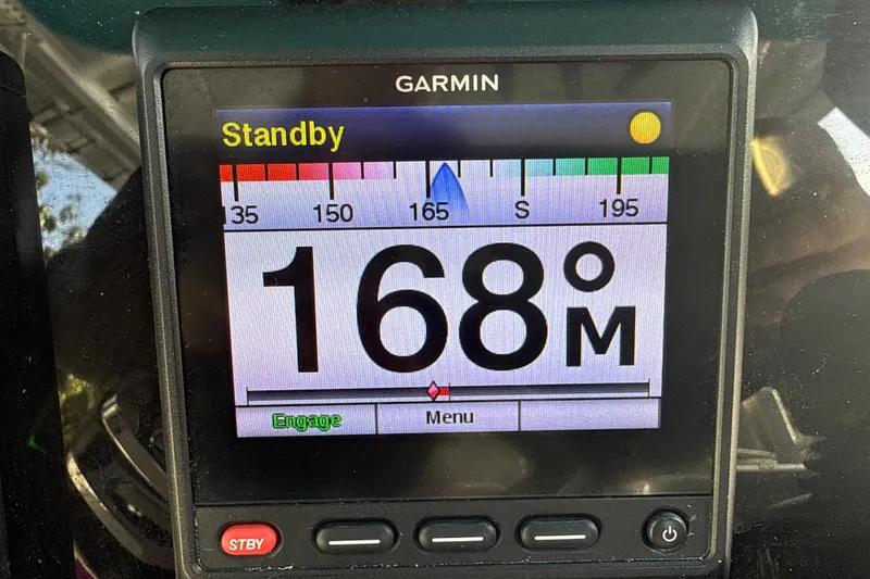 Slide: The Image of Garmin marine display showing 168° heading on a 2019 Century 3200 Center Console. - 58