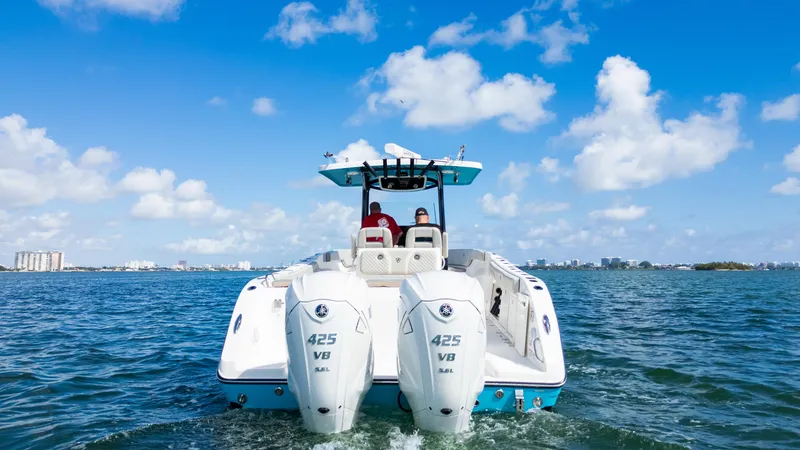 Slide: The Image of 2019 Century 3200 Center Console boat on open water under blue sky. - 6